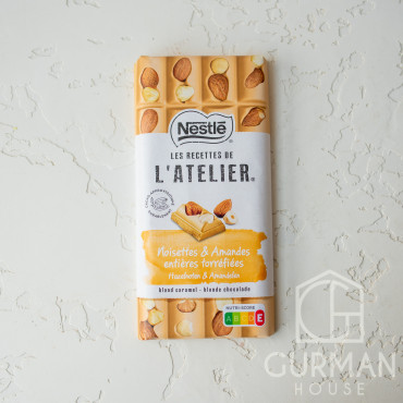 Крафтовый швейцарский шоколад Nestle L`atelier белый с карамелью, миндалем и лесным орехом 170 г